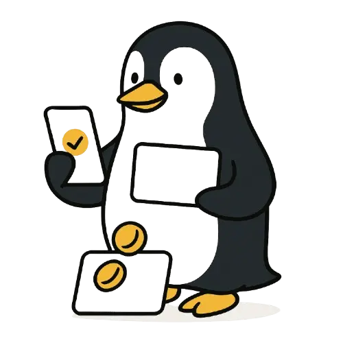 PIngviini, jolla k&auml;dess&auml; kortteja ja edess&auml; muutama keltainen kolikko ja pankkikortti